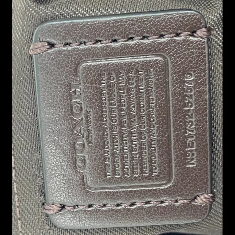 NEW Coach Bag Signature Canvas North South Swing pack 52576‎
